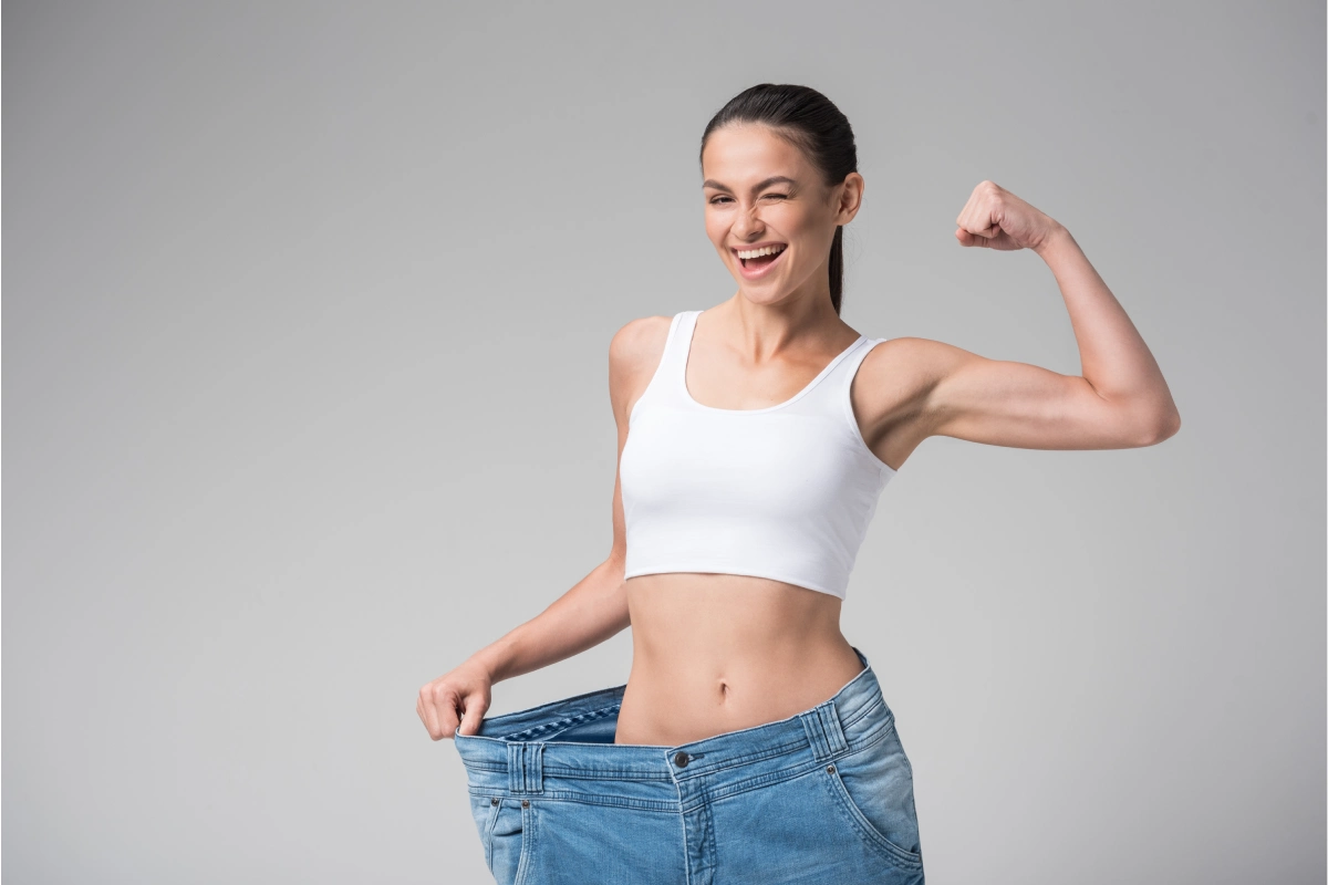 Patient showing weight loss results after a peptide weight loss program at Tú Beauty Med Spa.